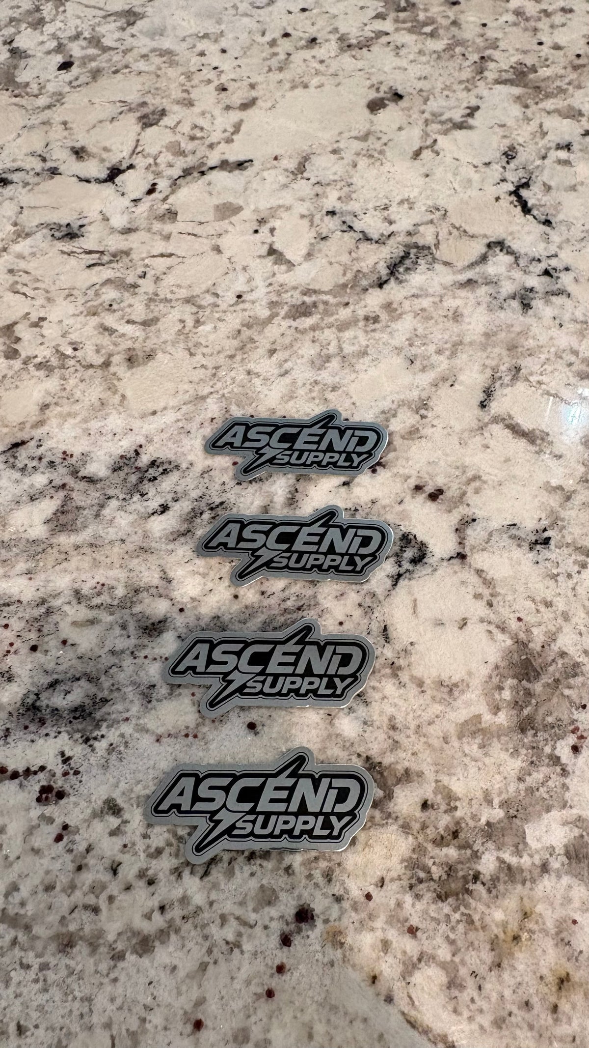 Ascend supply sticker packs and Spinner